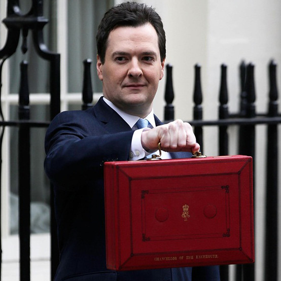 Chancellor of the Exchequer George Osborne walks out before presenting his annual budget to Parliament at 11 Downing Street